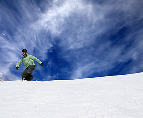 Image showing Snowboarder on off-piste slope