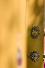 Image showing Background - Yellow Orange Door with Chipped Off Paint