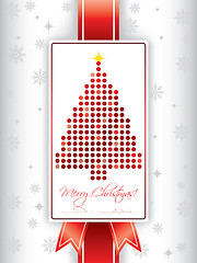 Image showing Christmas greeting card with ribbon and christmas tree