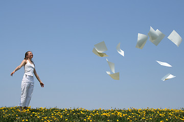 Image showing Paperwork going away with the wind