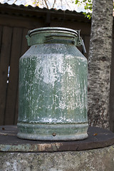 Image showing Old metal milk can