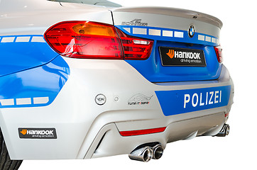 Image showing Back view of new modern model BMW German police patrol car