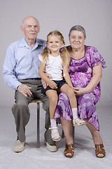 Image showing Group portrait: grandmother, grandfather and granddaughter