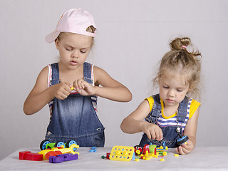 Image showing Two children play in the constructor