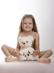 Image showing Four-year-old girl bear hug