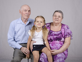 Image showing Group portrait: grandmother, grandfather and granddaughter