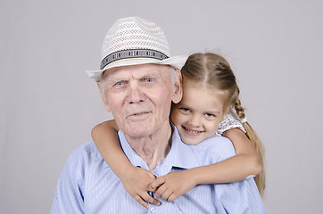 Image showing Portrait of an old man eighty years with granddaughter