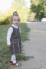 Image showing little girl waits for the bus