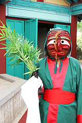 Image showing Person in traditional South Korean costume and mask