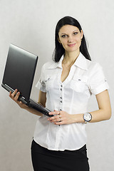 Image showing Business girl with a laptop