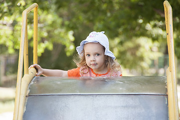 Image showing little girl up stairs at children of old metal hill