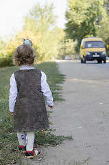 Image showing little girl waits for the bus