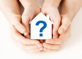 Image showing hands holding house with question mark