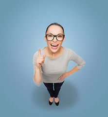 Image showing asian woman in eyeglasses with finger up