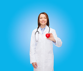 Image showing smiling female doctor with heart and stethoscope