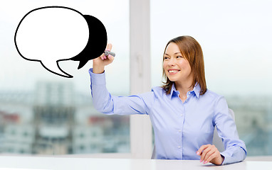 Image showing businesswoman drawing text bubble