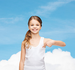 Image showing smiling teenage girl in blank white shirt