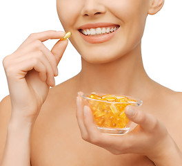 Image showing beautiful woman with omega 3 vitamins