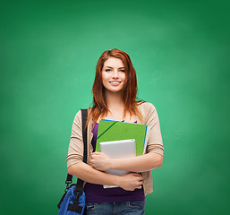 Image showing smiling student with bag, folders and tablet pc