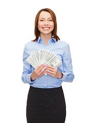 Image showing young businesswoman with dollar cash money