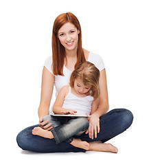 Image showing happy mother with little girl and tablet pc