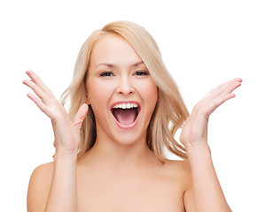 Image showing face and hands of happy woman with long hair