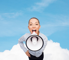 Image showing screaming businesswoman with megaphone