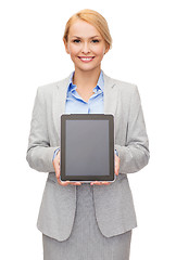 Image showing businesswoman with blank black tablet pc screen