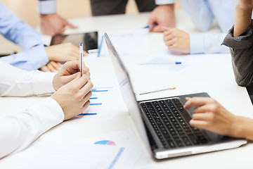 Image showing close up of files and laptop computer in office