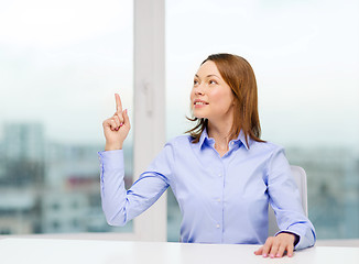 Image showing attractive businesswoman at office