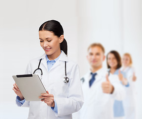 Image showing female doctor with stethoscope and tablet pc