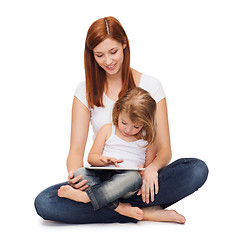 Image showing happy mother with little girl and tablet pc