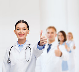 Image showing smiling female doctor with stethoscope