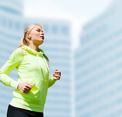 Image showing woman doing running outdoors