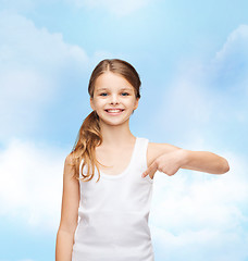 Image showing smiling teenage girl in blank white shirt