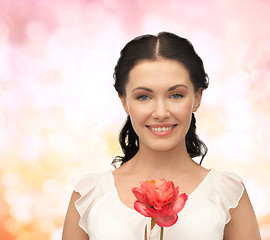 Image showing young and beautiful woman with flower