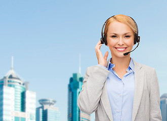 Image showing friendly female helpline operator