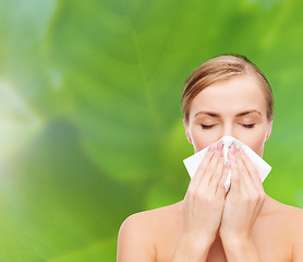 Image showing beautiful woman with paper tissue