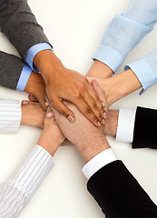 Image showing group of businesspeople celebrating victory