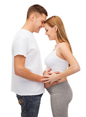 Image showing happy young family expecting child