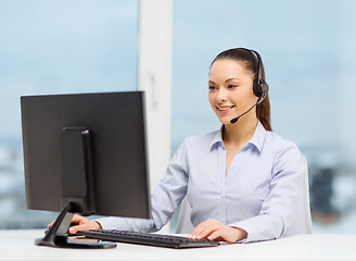 Image showing friendly female helpline operator