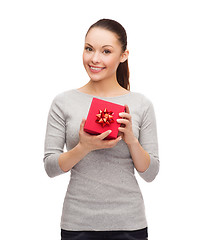 Image showing beautiful girl with red gift box