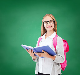 Image showing girl reading book at school