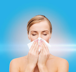 Image showing beautiful woman with paper tissue