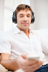 Image showing man with headphones listening to music