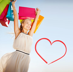 Image showing woman with shopping bags