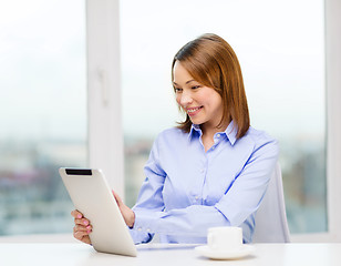 Image showing smiling businesswoman or student with tablet pc