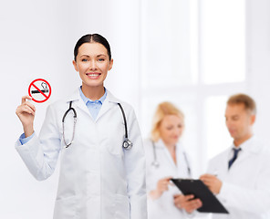 Image showing smiling female doctor with stethoscope