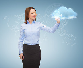 Image showing smiling businesswoman working with virtual screen