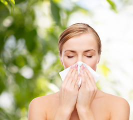 Image showing beautiful woman with paper tissue